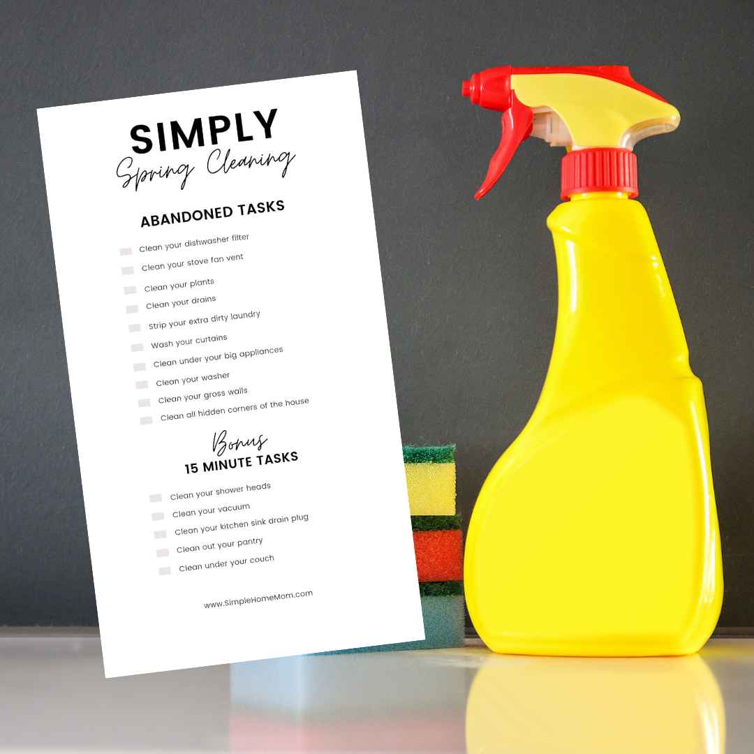 Cleaning supplies next to the printable challenge.